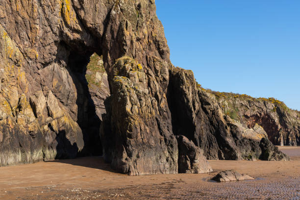 istock Cliff walls on the beach. 1391323135