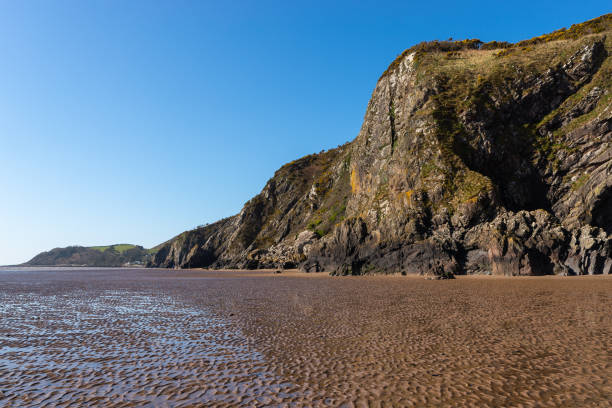 istock Cliff walls on the beach. 1391323220