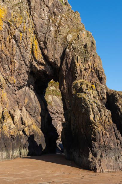 istock Cliff walls on the beach. 1391323221