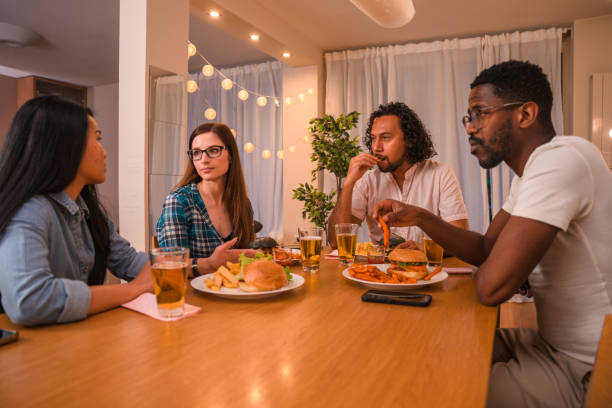 istock Diverse Friends at Dinner Party 1391324710