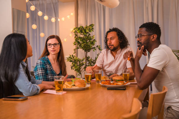 istock Diverse Friends at Dinner Party 1391324713