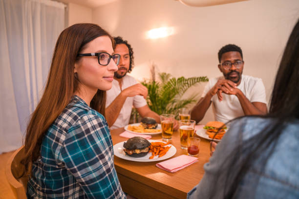 istock Diverse Friends at Dinner Party 1391324716