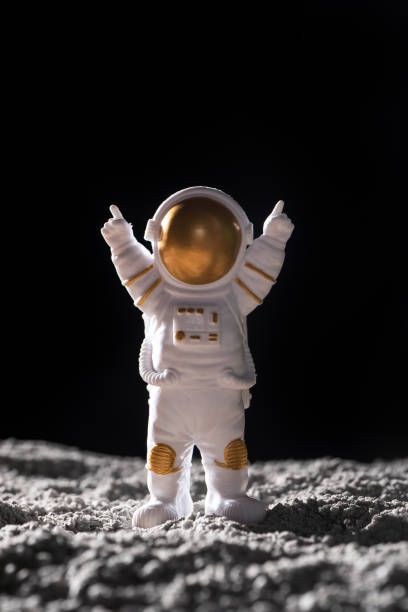 istock Spaceman stand on surface of alien planet. 1391325203