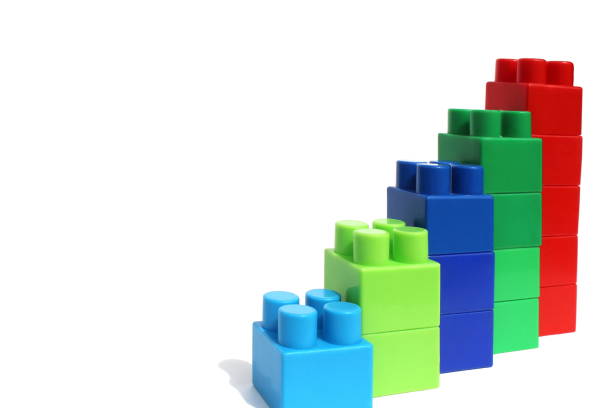 istock Bright multi-colored cubes of the designer scattered lie on a white isolated background. 1391335299