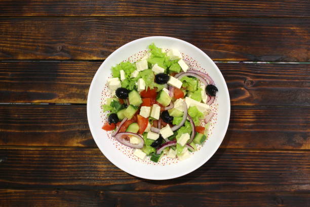 istock A plate with a brine cheese salad with vegetables. 1391336286