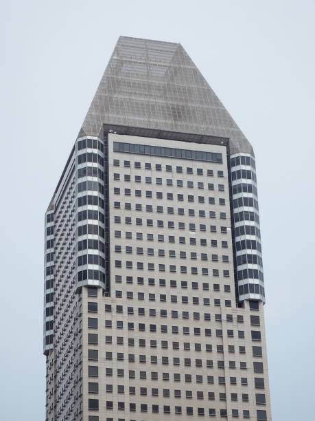 Singapore City, Singapore - 28th April, 2016:The top of 41-storey Millenia Tower, the centerpiece of the Millenia Singapore development, Temasek Avenue, Marina Centre, Singapore.