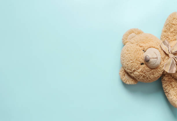 istock teddy bear on the turquoise floor closeup 1391340600