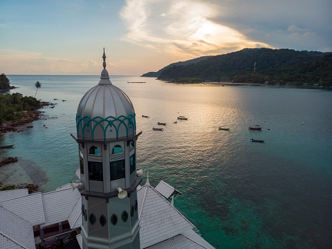 Ar Rahman Mosque at Perhentian Island overlooking the calm ocean during sunrise is breathtaking. This main island is inhabited for centuries and now is one of the most popular islands in Malaysia with many snorkeling and scuba diving spots around here.