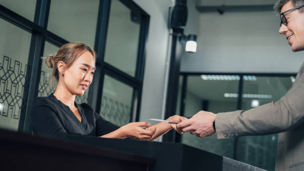 istock Multiracial people standing in queue to check in in airport hall 1391342865