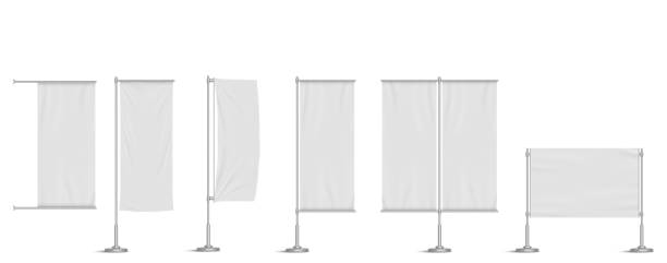 Street banners, ads textile stands on metal poles Street banners, ads textile stands on metal poles. Vertical and horizontal vinyl signboards for city advertising. Blank billboards displays isolated on white background Realistic 3d vector mock up set advertising column stock illustrations