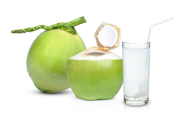 istock Fresh coconut juice (coconut water) and young green coconut fruit isolated on white 1391348497