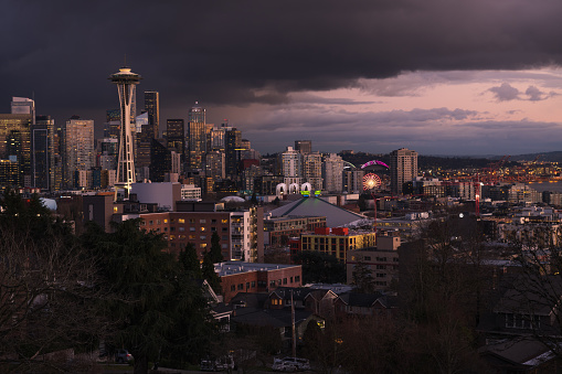 A rainy sunset over Seattle as a storm moves through the city.