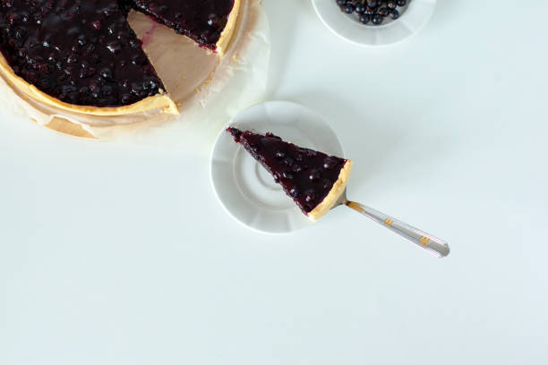 istock Sweet sliced cake with black currant 1391350362