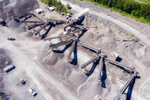 istock Crushing and screening plant for processing and sorting crushed stone, sand and gravel. View from above 1391350886