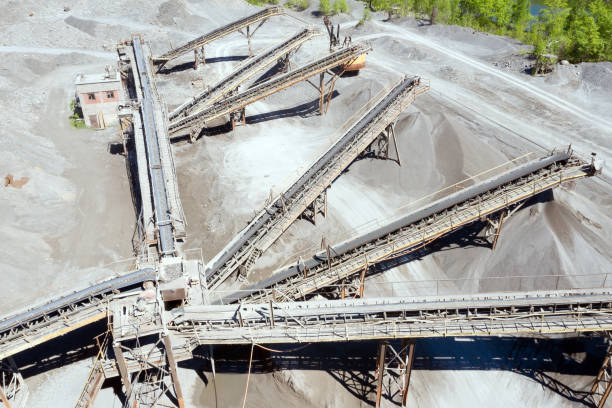 istock Crushing and screening plant for processing and sorting crushed stone, sand and gravel. View from above 1391352028