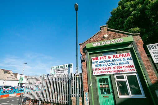 Wildwood Fit and Repair Shop in Strood near Rochester in Kent, England, with commercial details visible.