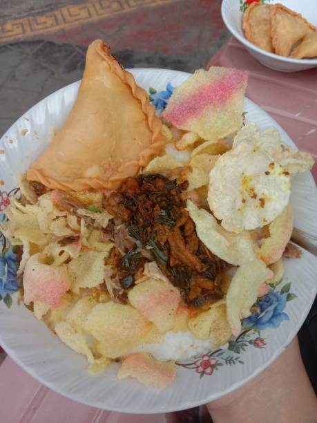 istock Bubur Ayam (chicken porridge) Indonesian traditional breakfast dish 1391354150