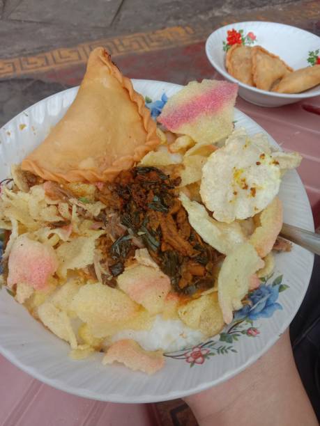 istock Bubur Ayam (chicken porridge) Indonesian traditional breakfast dish 1391355111