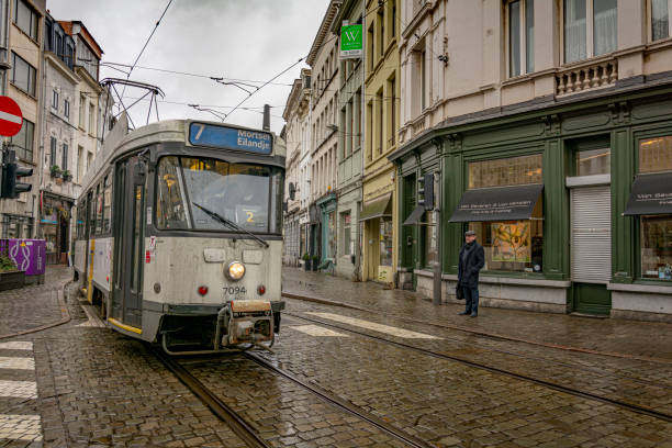 A tram at Antwerp old centre in a rainy day