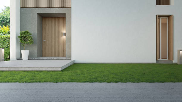 casa de lujo con pared de hormigón y puerta de entrada de madera en diseño moderno. - hotel sign built structure building exterior fotografías e imágenes de stock