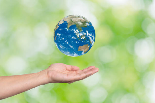 istock Hands of people who receive the earth 1391357899