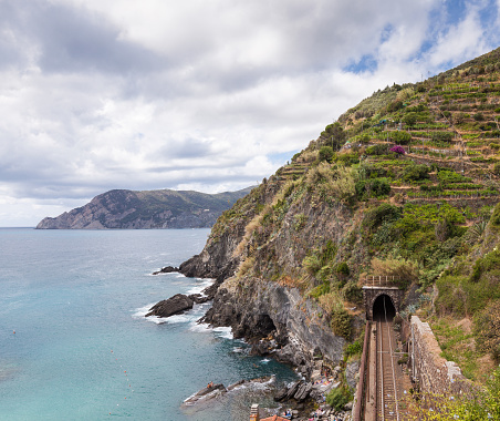 The railway line connecting the towns of Cinque Terre near Vernazza. The small fishing village Vernazza is probably the most characteristic of the Cinque Terre and is classified as one of the most beautiful villages in Italy. Vernazza was founded about 1000AD and was ruled by the Republic of Genoa starting in 1276.