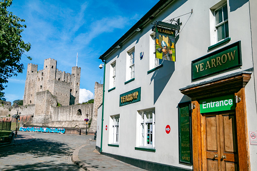 Ye Arrow Pub near Rochester Castle in Kent, England. These are commercial venues.
