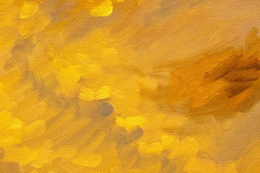 This is a closeup from yellow blue  and black oil painting on linen canvas made with high quality artist paints and tools. Showing paintbrush strokes and traces from palette knives. Photographed in daylight with Canon 5D Mark II and 100mm macro lens. Suitable as backgrounds, wallpaper or decorative art. Created by me.