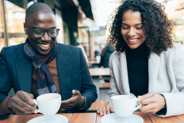 istock Lovely couple having date in a cafe 1391361338