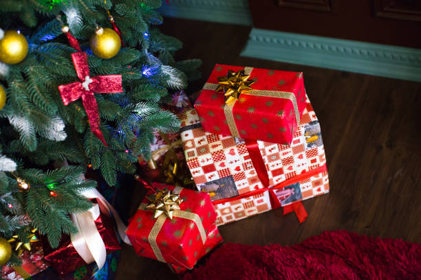 istock New Year's gifts are under the tree. 1391364479