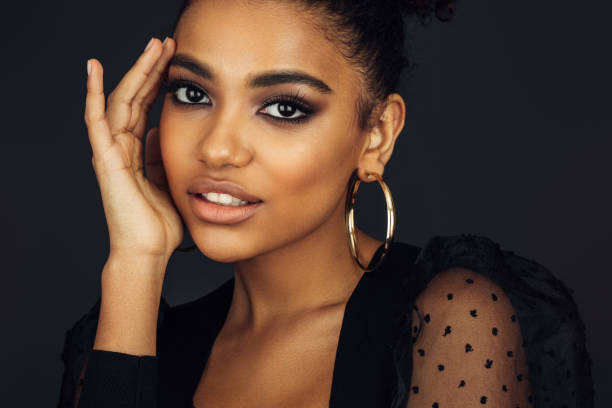 istock Beautiful afro woman with perfect make-up 1391364641