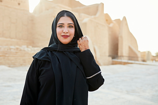 istock Outdoor portrait of Middle Eastern woman at Salwa Palace 1391369778