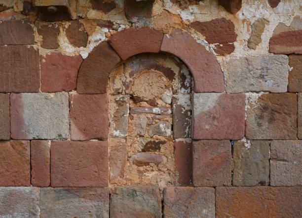istock Old rock wall construction in a house 1391372154