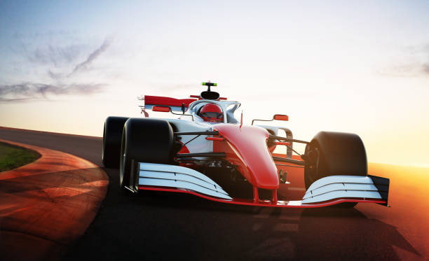istock red race car driving on a race track 1391374027