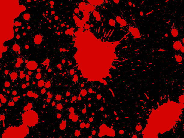 istock red drops of paint on a black background 1391375307