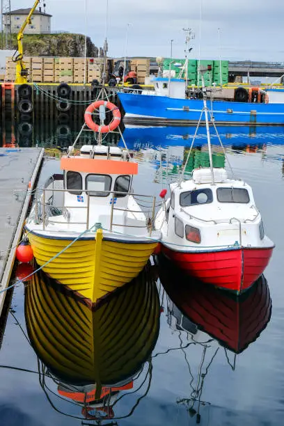 Stykkisholmur harbour, with small fishing boats moored at the pier. Saefellsnes, IcelandSaefellsnes, Iceland