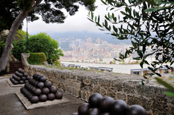 Old guns and gun's bullets in the Place du Palais square (palace square), Monaco-Ville, Monaco