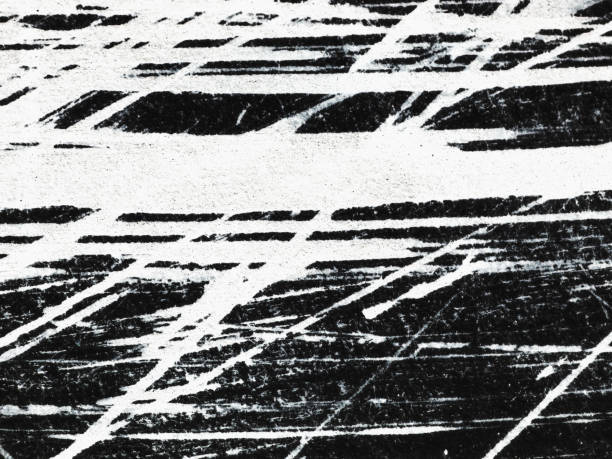 Patterns of white paint from a brush on a black background Patterns Abstract texture or background wall. white paint pattern over black. scuff marks photos stock pictures, royalty-free photos & images