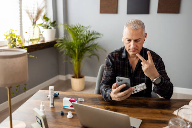 istock Freelancer Working From Home and Talking a Medic Over the Internet 1391378616
