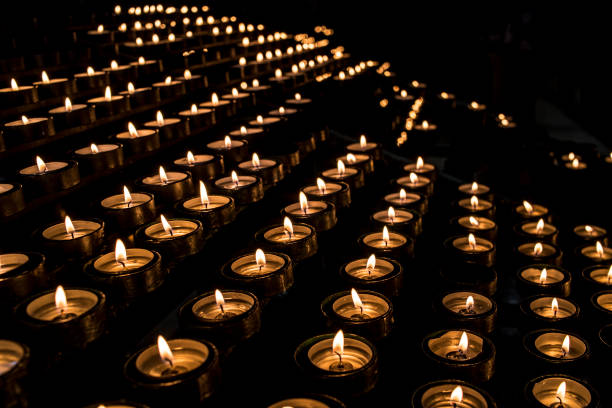 istock candle offerings in a catholic sanctuary in Spain 1391380291
