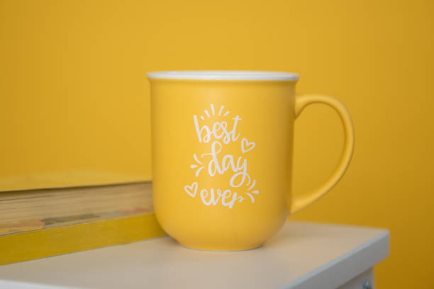 istock Yellow mug and books 1391391316