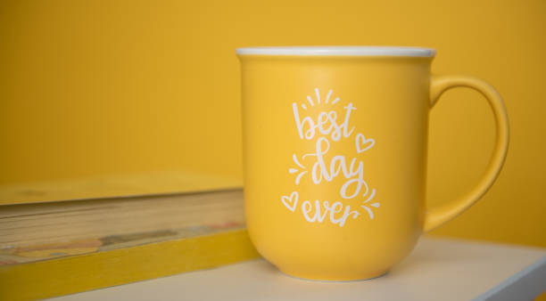 istock Yellow mug and books 1391391337