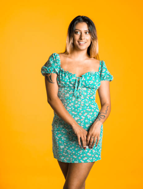 istock She is in a casual outfit against yellow. 1391391420