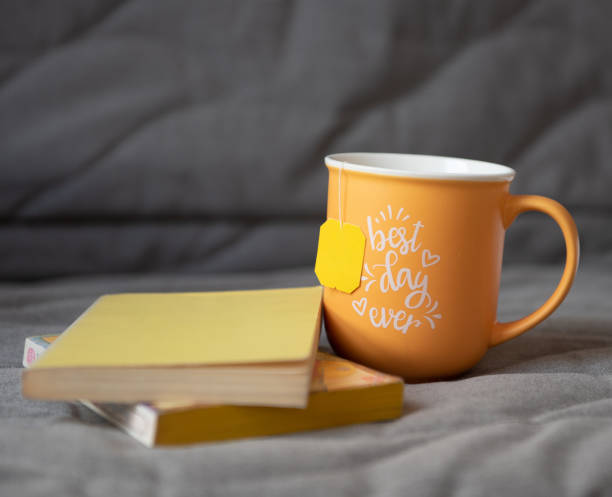 istock Yellow mug with books 1391391443