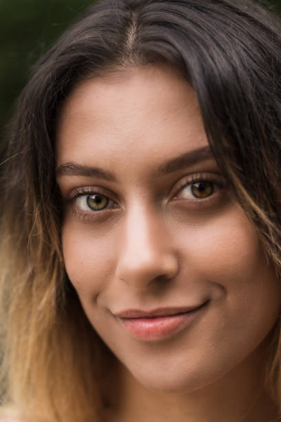 The close shot of a Maori woman .