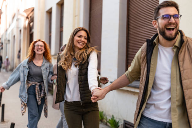istock Couple walking and having a great time with friends 1391394724