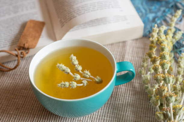 istock Tea in a turquoise cup with decoration - Greek mountain tea, herbal tea, white tea 1391395483