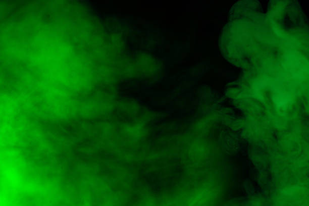 istock Green steam on a black background. 1391398875