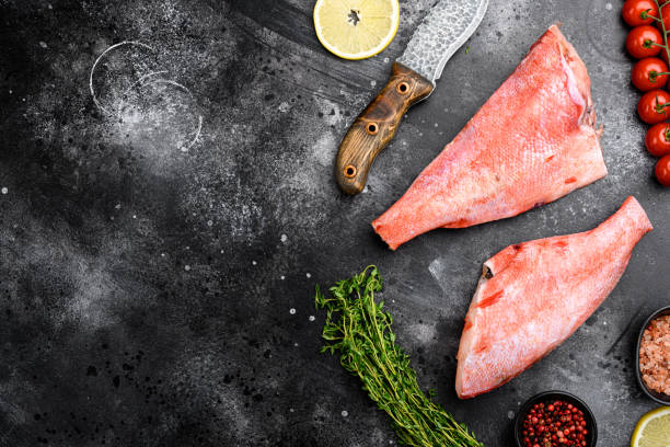 istock Sea perch, on black dark stone table background, top view flat lay, with copy space for text 1391400779