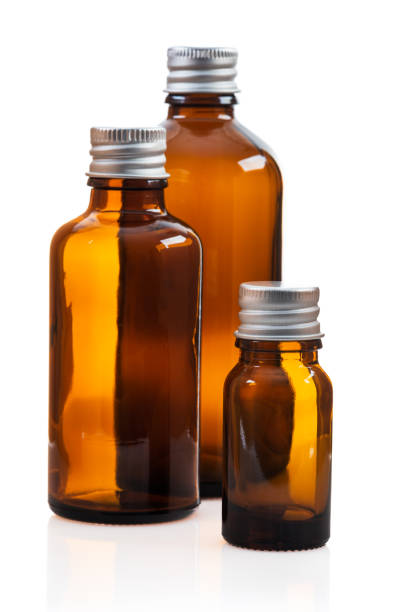 istock Small glass bottles isolated on white 1391401874